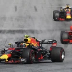 Mobil Red Bull Racing dan Ferrari melaju di Red Bull Ring pada balapan Formula 1 GP Austria